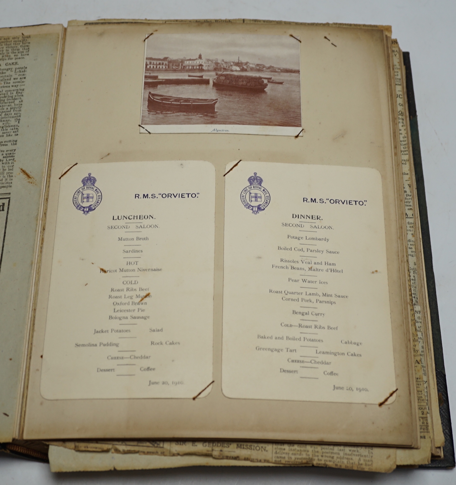 An Ocean liner scrap book and a collection of loose leaves of boating and shipping related postcards